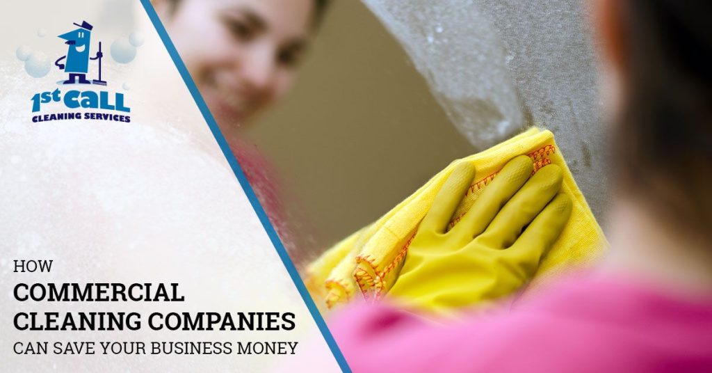 Photo of a professional cleaner wearing yellow gloves wiping a mirror with a yellow cleaning cloth, with the text ‘How Commercial Cleaning Companies Can Save Your Business Money’ and the 1st Call Cleaning Services logo on a semi-transparent white background.
